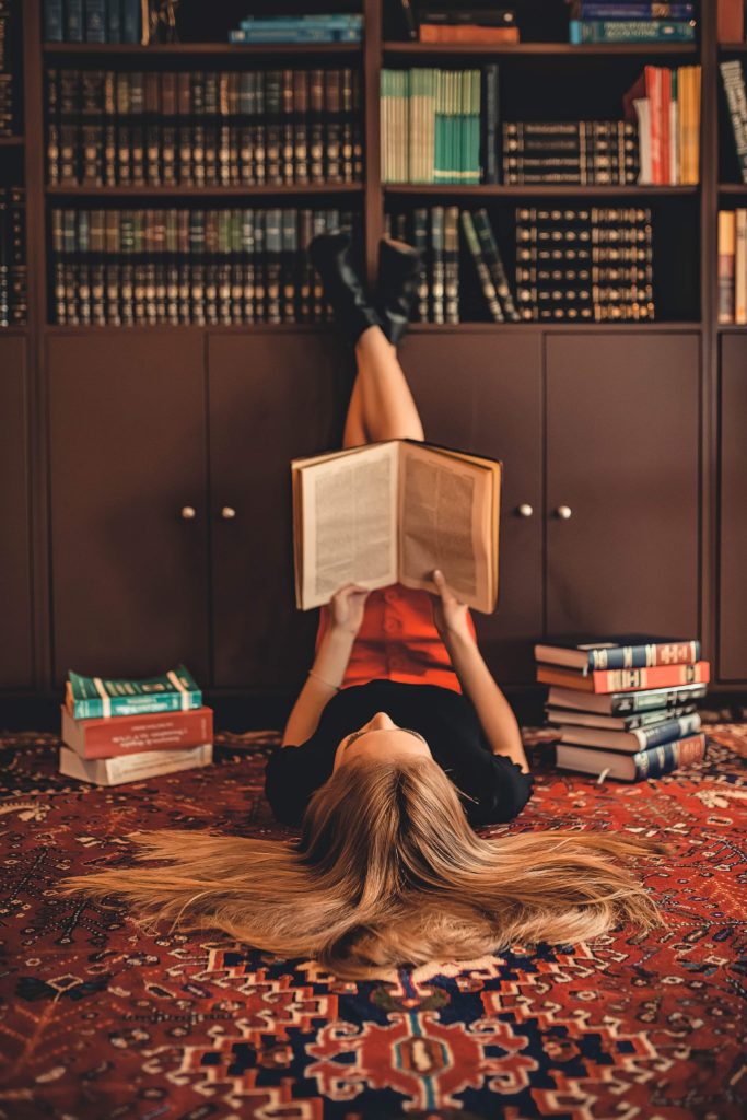 Girl reading a book.
